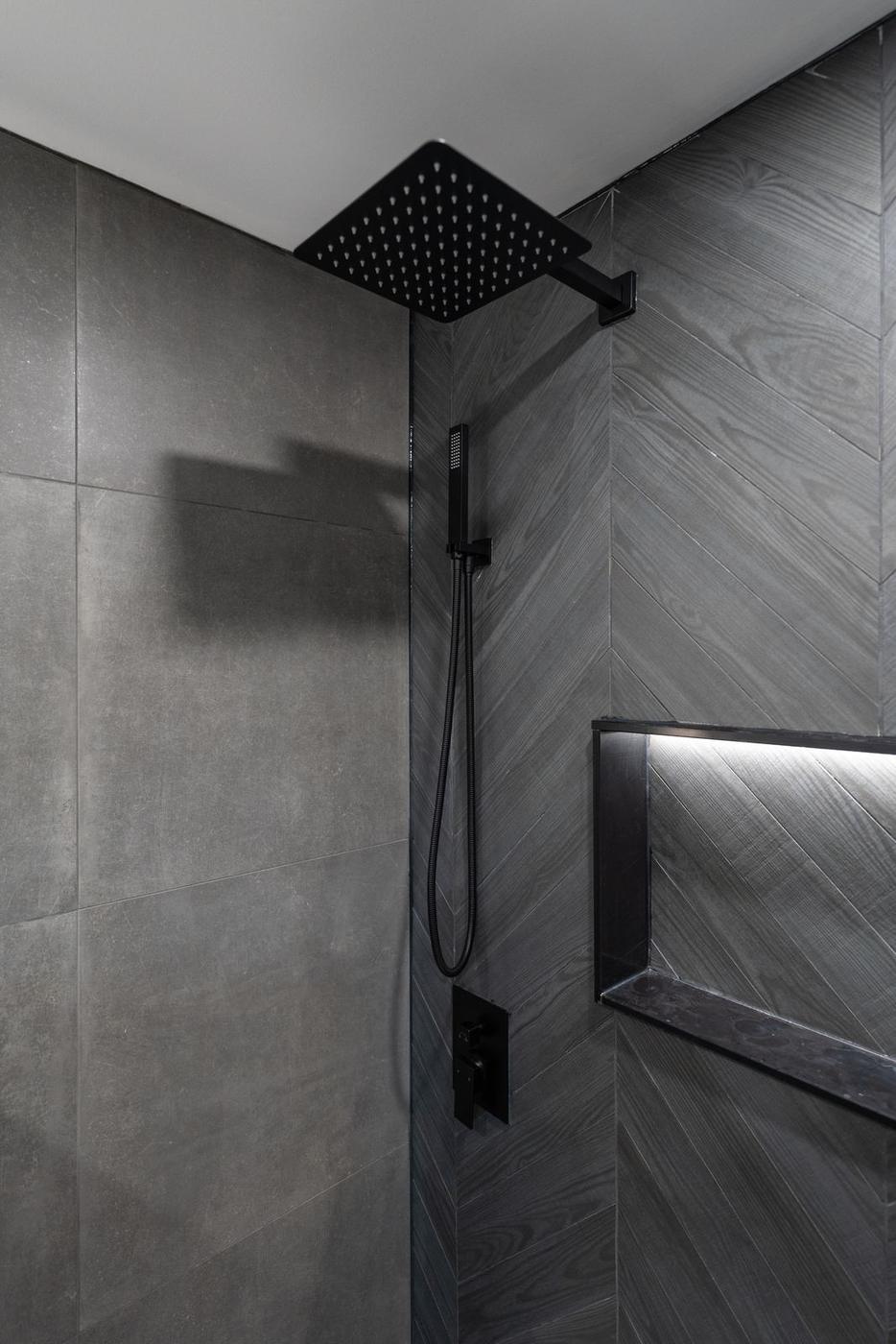 Slate Chevron Spa Bathroom, Ajax: Rain shower head against large-format tile
