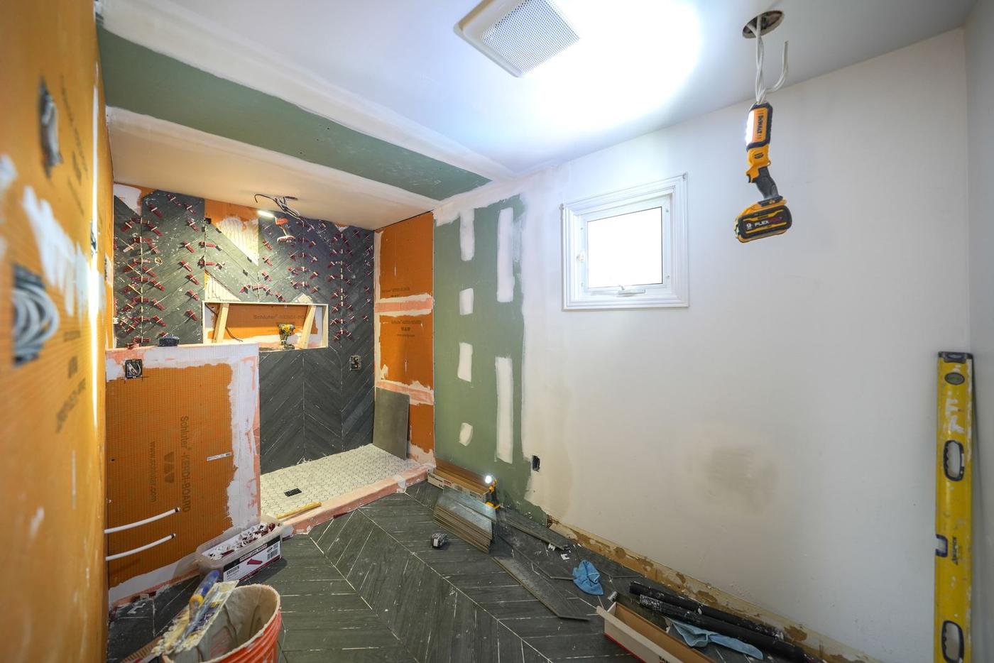Slate Chevron Spa Bathroom, Ajax: Shower base and hexagon floor tile in progress