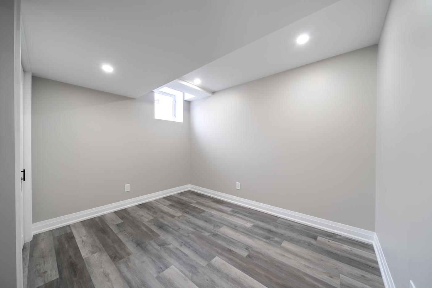Open-Concept Basement Suite, Oshawa: Bedroom with a window