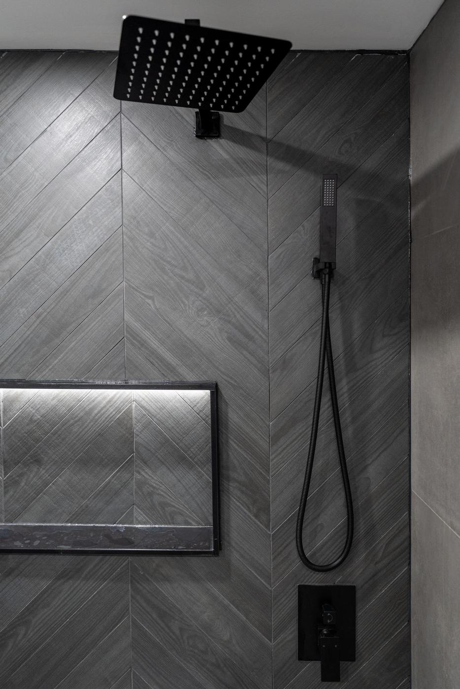 Slate Chevron Spa Bathroom, Ajax: Rain shower head and hand shower on chevron tile