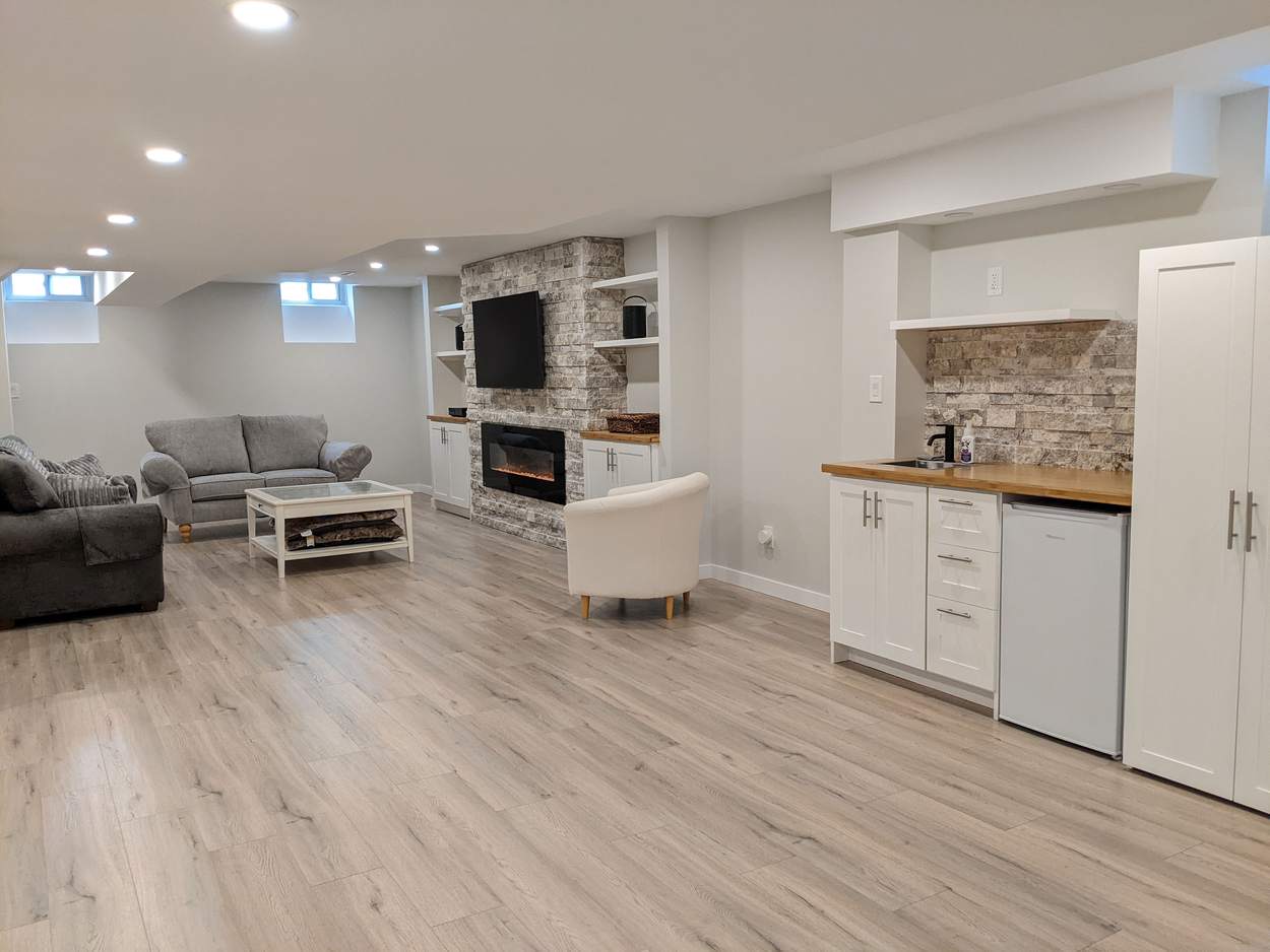 Chef's Kitchen and Entertainer's Basement, Whitby: Open-concept basement lounge with a kitchenette