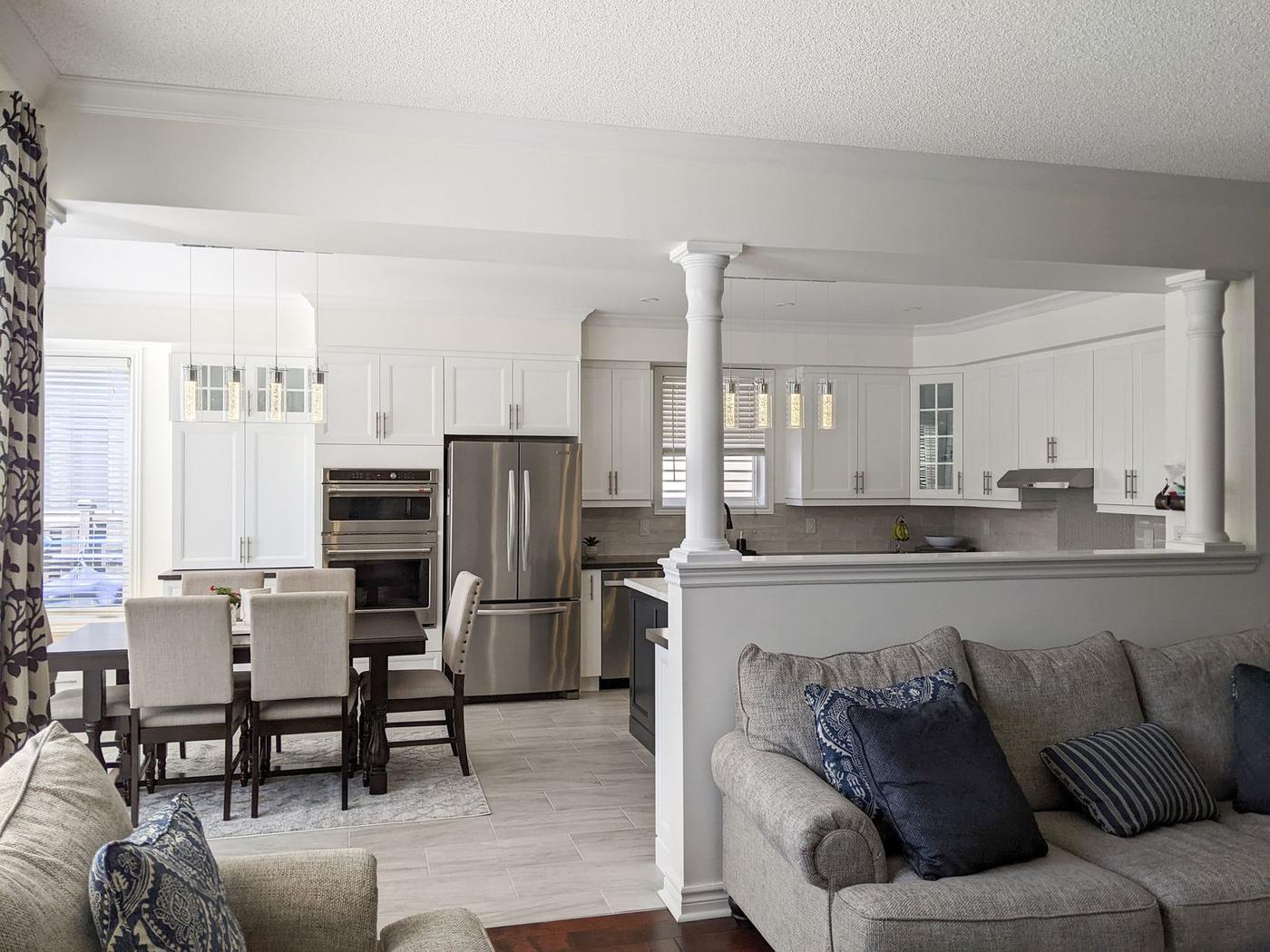 Chef's Kitchen and Entertainer's Basement, Whitby: Kitchen and dining area open to the family room