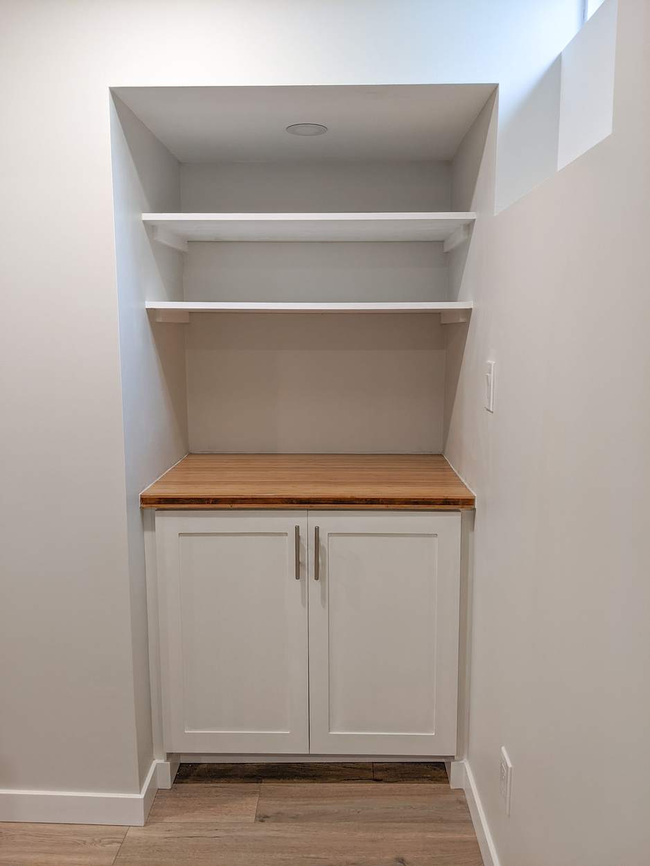 Chef's Kitchen and Entertainer's Basement, Whitby: Built-in cabinet nook with open shelving
