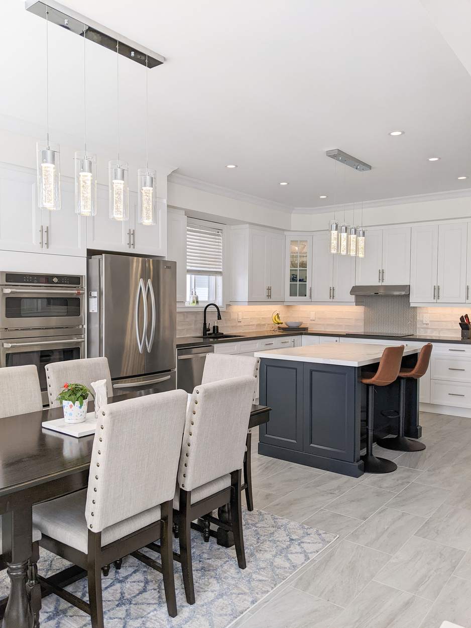 Chef's Kitchen and Entertainer's Basement, Whitby: Dining table and charcoal island seen from the entry