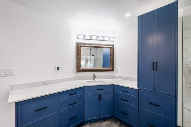 Marble and Navy Primary Ensuite, Courtice: Straight-on view of the blue vanity