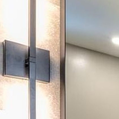 Matte black wall sconce
