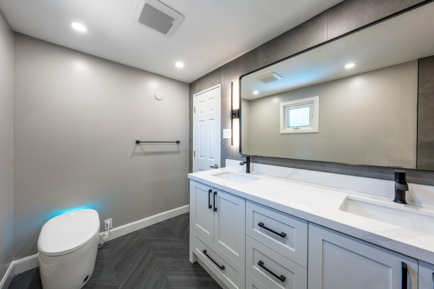 Slate Chevron Spa Bathroom, Ajax: Vanity, large mirror and smart toilet