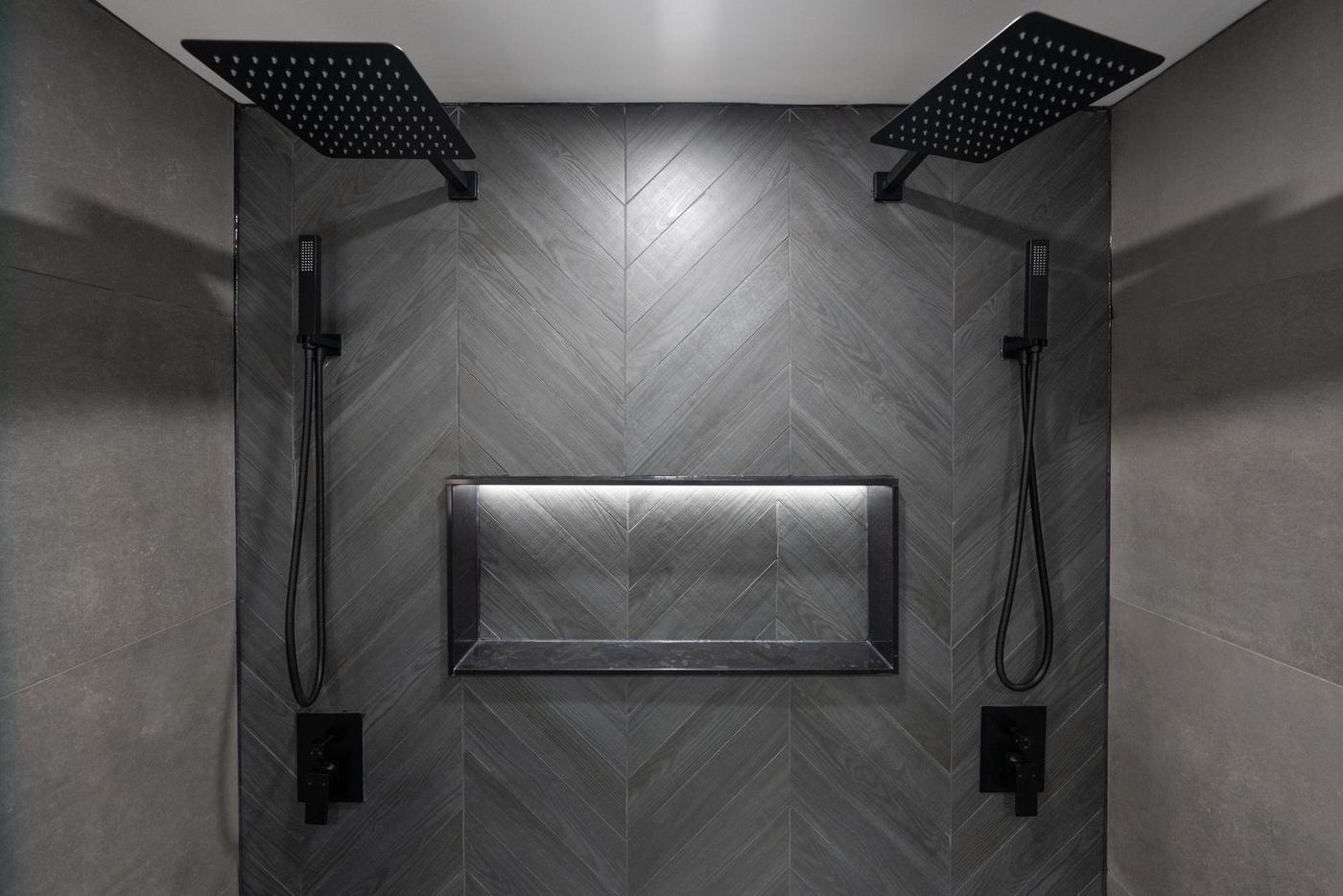 Slate Chevron Spa Bathroom, Ajax: Dual rain showers with a lit niche