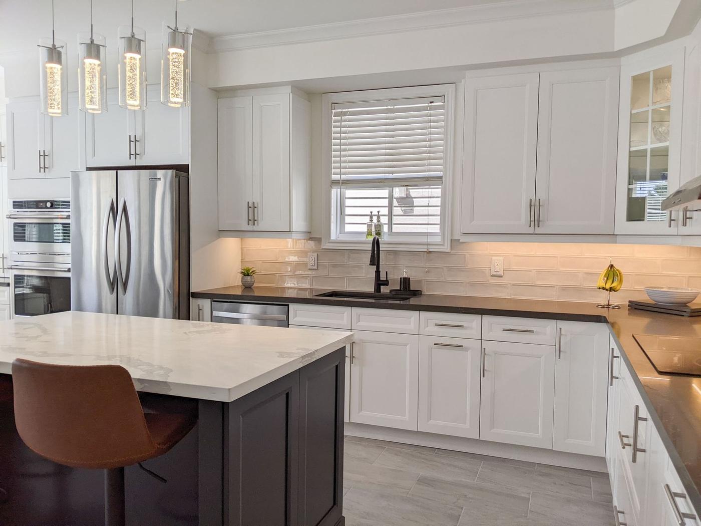 Chef's Kitchen and Entertainer's Basement, Whitby: Sink and dishwasher wall with under-cabinet lighting