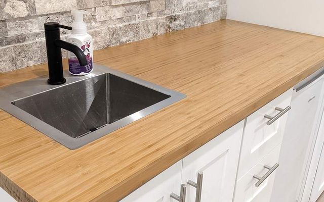 Bamboo butcher-block counter with a bar sink