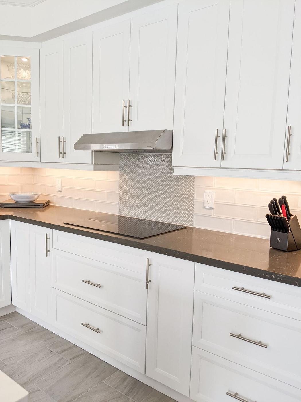 Chef's Kitchen and Entertainer's Basement, Whitby: Cooktop and drawer stack with under-cabinet lighting