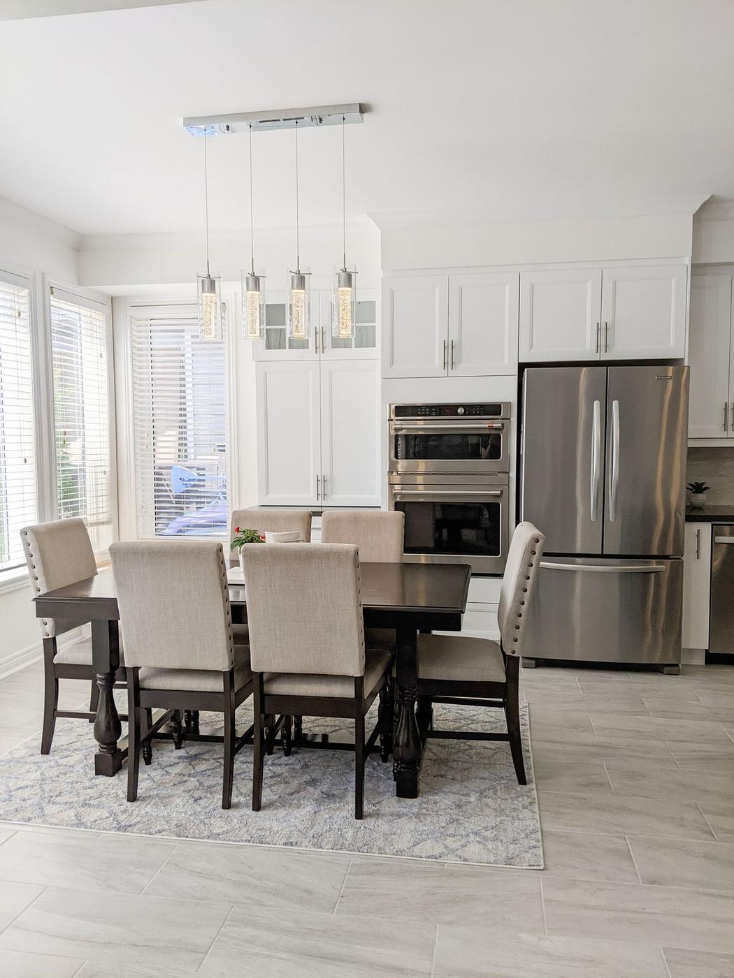 Chef's Kitchen and Entertainer's Basement, Whitby: Bright dining nook beside the wall ovens and refrigerator