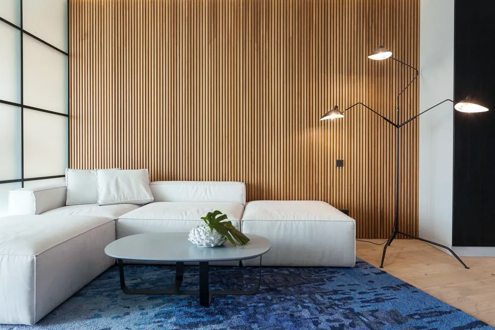 Commercial interior with a wood slat accent wall and modern lounge seating