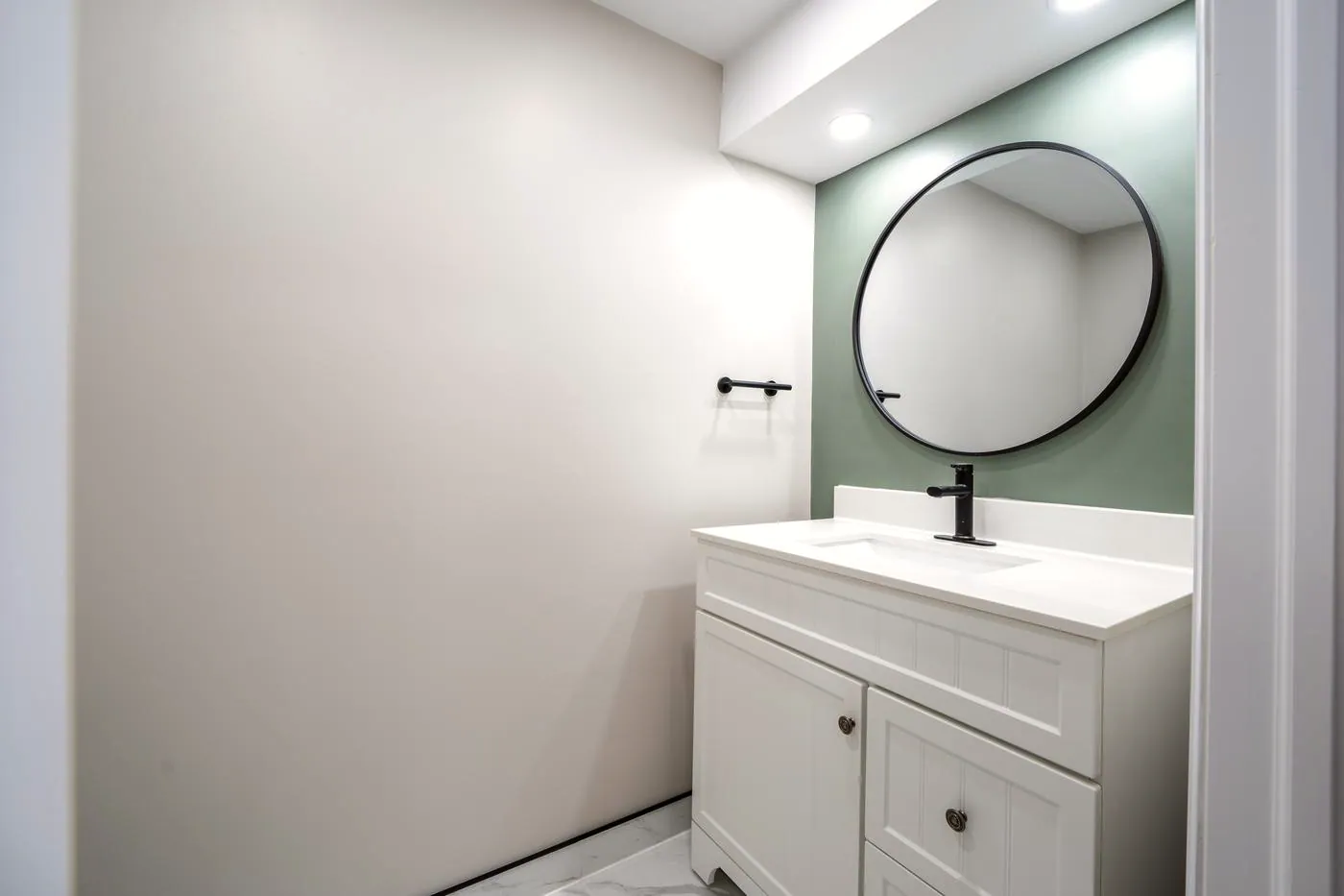 Powder room with a green accent wall, Oshawa