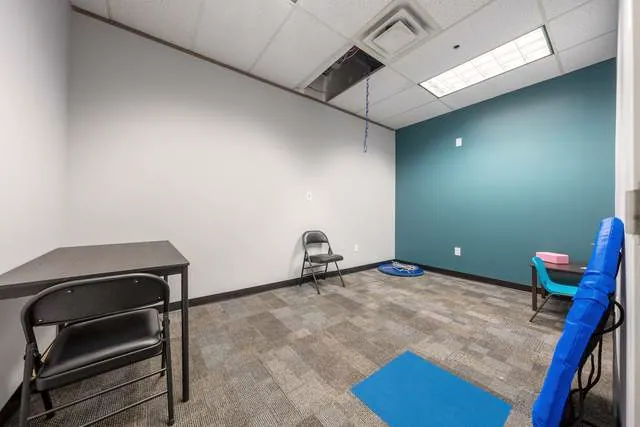 Therapy room with a teal accent wall, Whitby